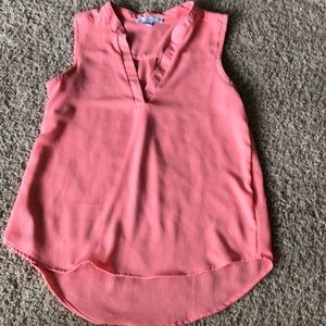 Coral sleeveless blouse
